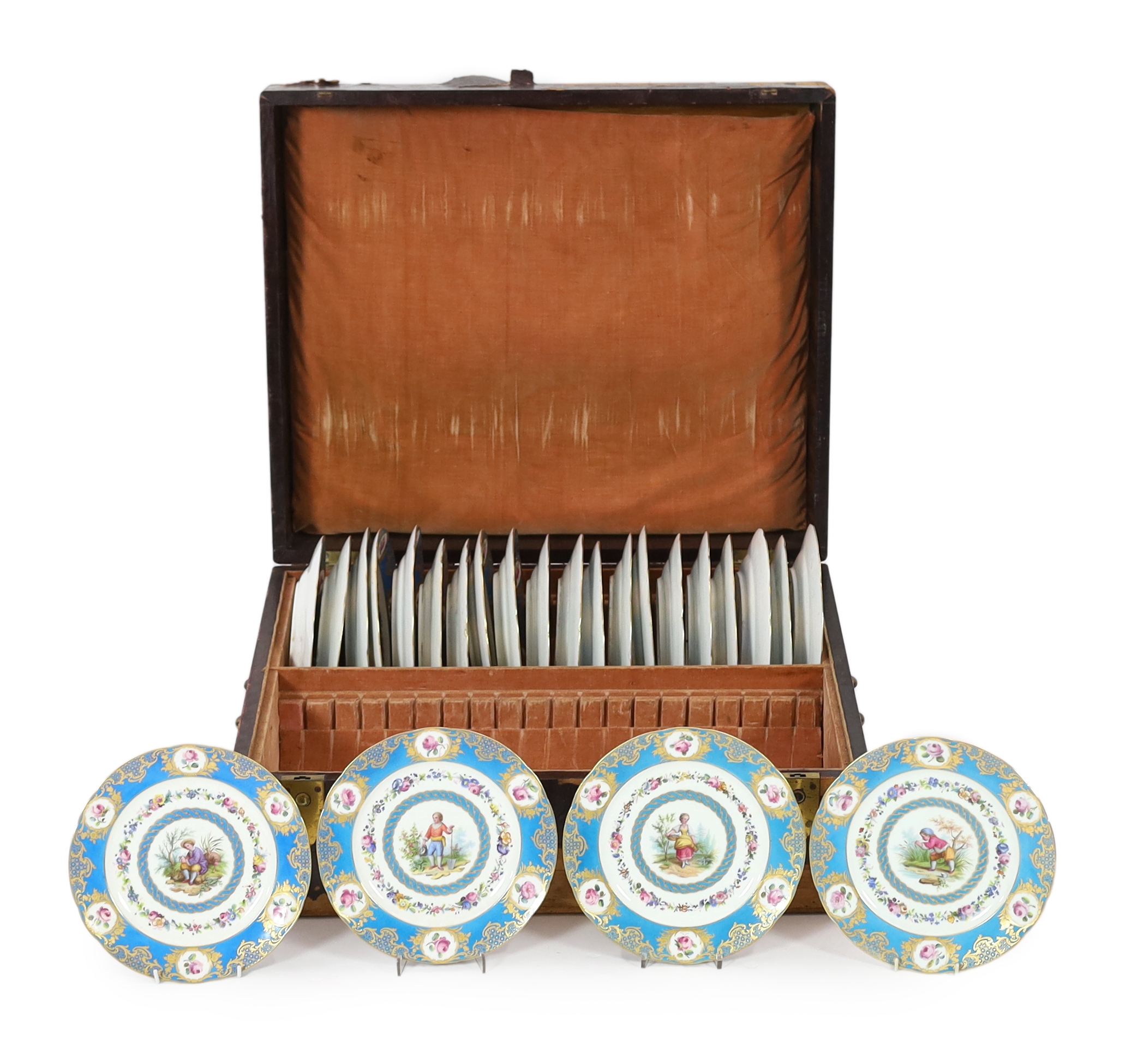 A cased set of twenty four Sevres style cabinet plates, 19th century